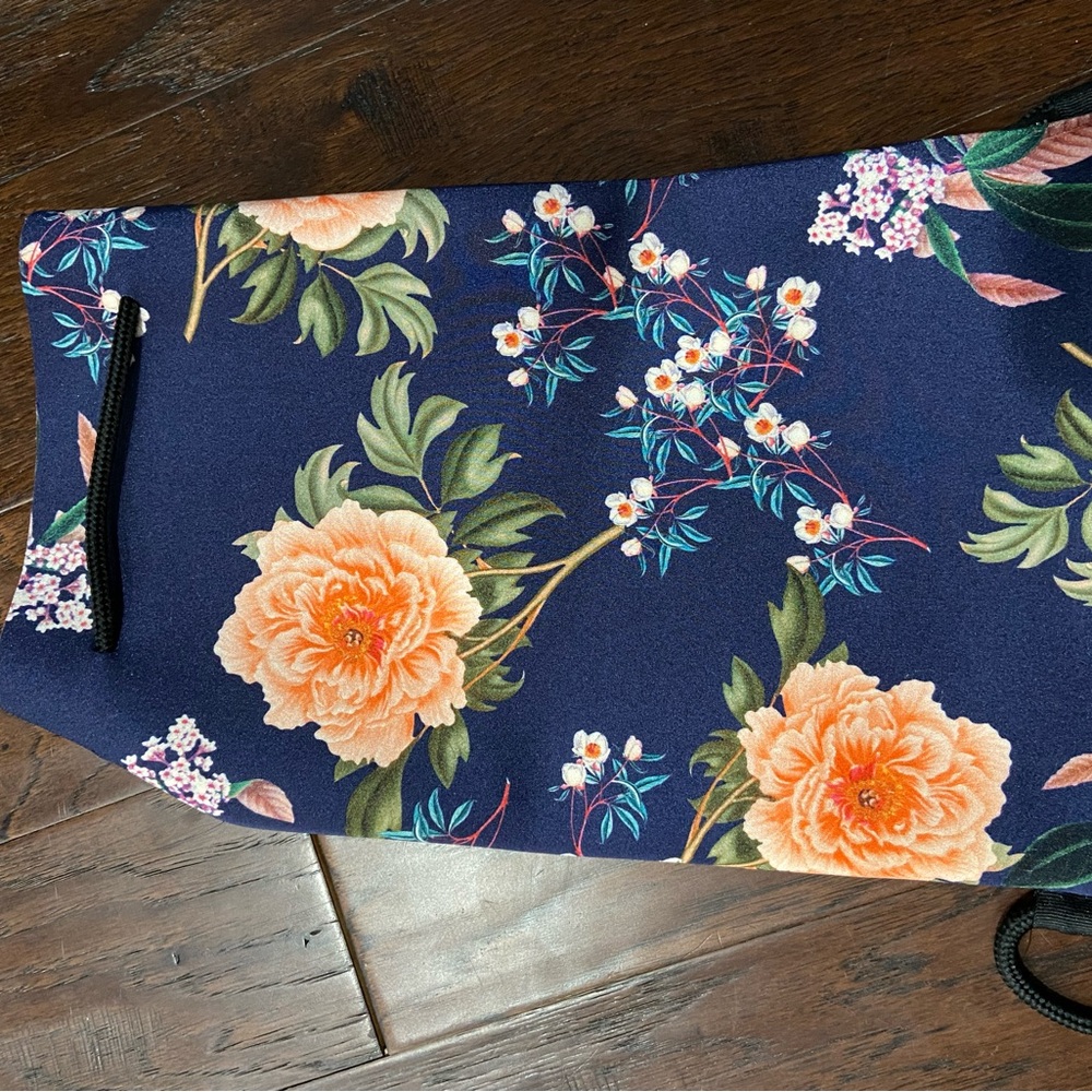 Triangl Floral Print pull string backpack